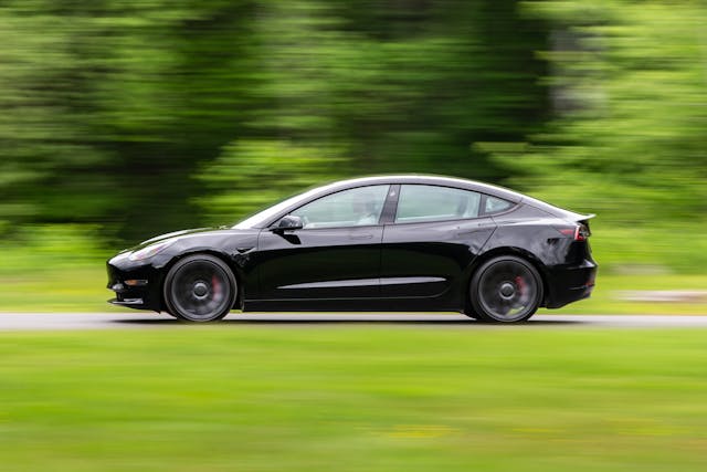 2021 Tesla Model 3 Performance side profile driving action