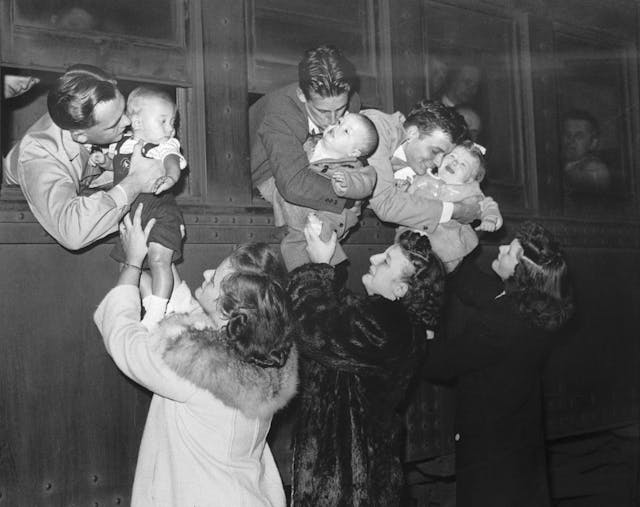 Drafted Dads Say Goodbye to Families Michigan Central Station