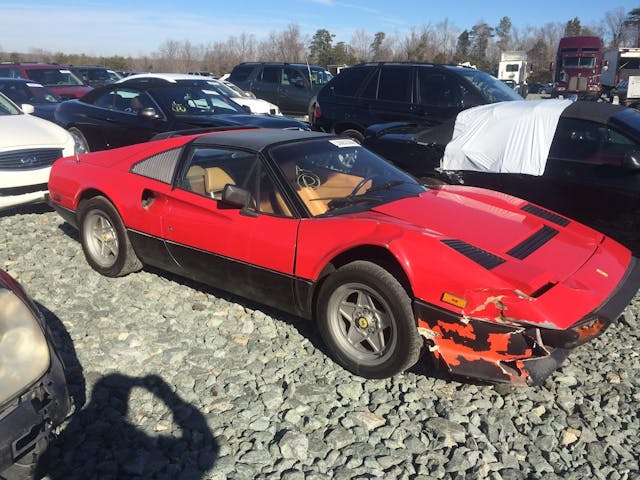 ferrari parts car in junkyard