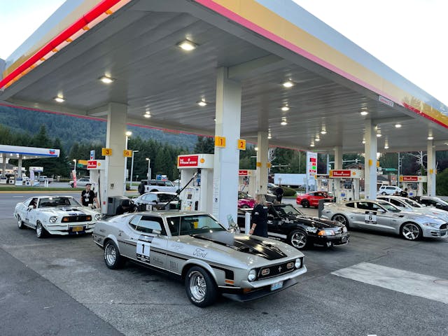 Mustangs at gas station