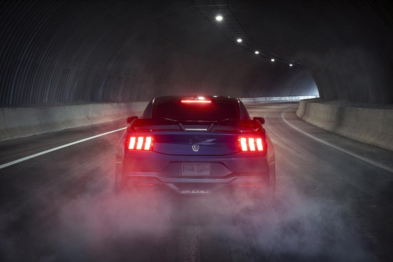 Ford Mustang Dark Horse exterior rear end smoke in tunnel