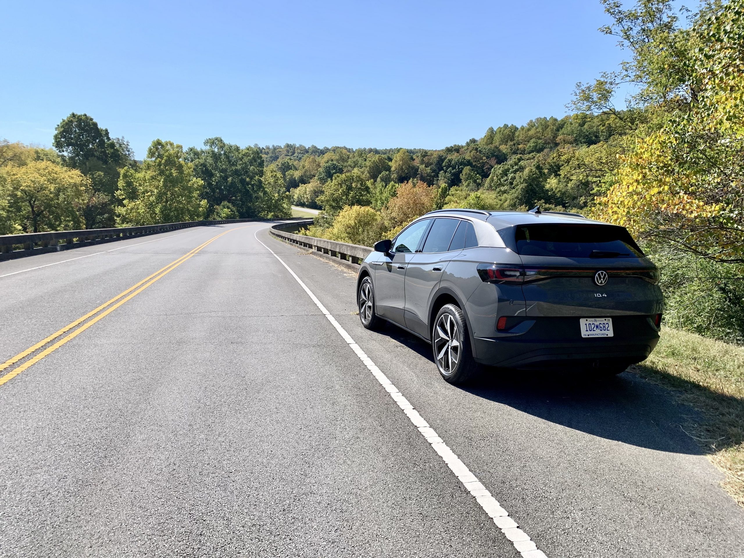 2023 Volkswagen ID.4 exterior rear three quarter winding road