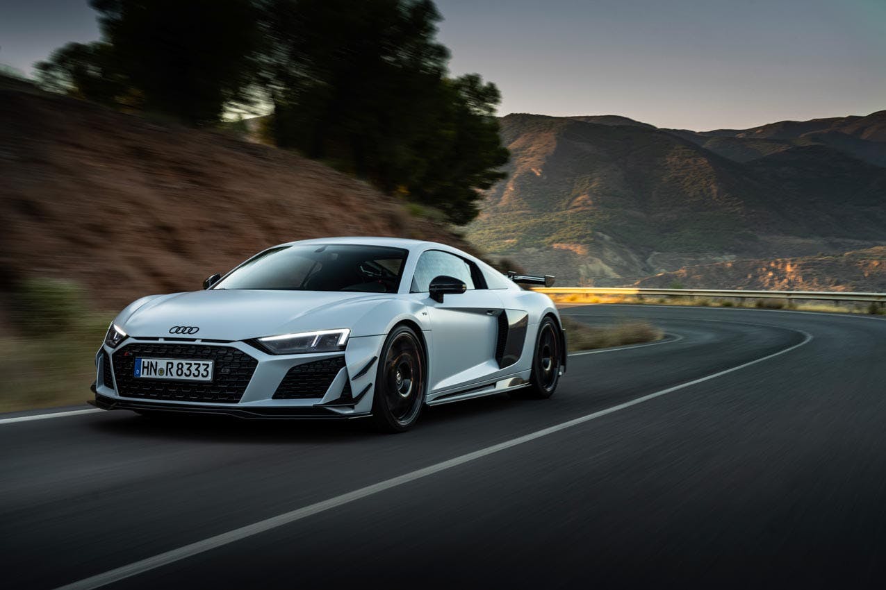 Audi R8 V10 GT RWD exterior front three quarter driving in canyon