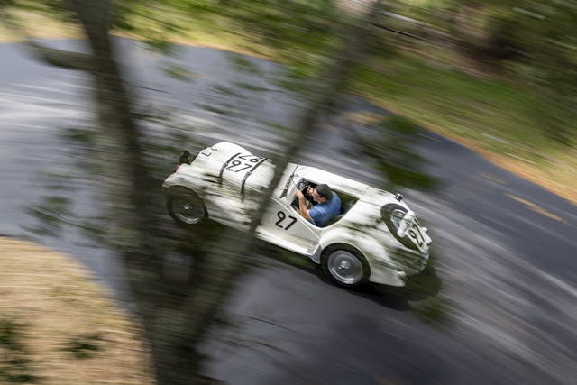 BMW 328 race car high angle rear three-quarter driving action