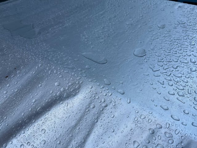 Car cover precipitation beeding