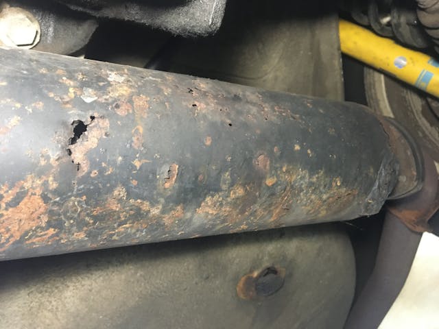 Pipe muffler hole gap