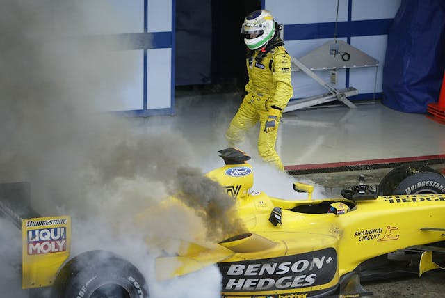 Giancarlo Fisichella of Italy car on fire