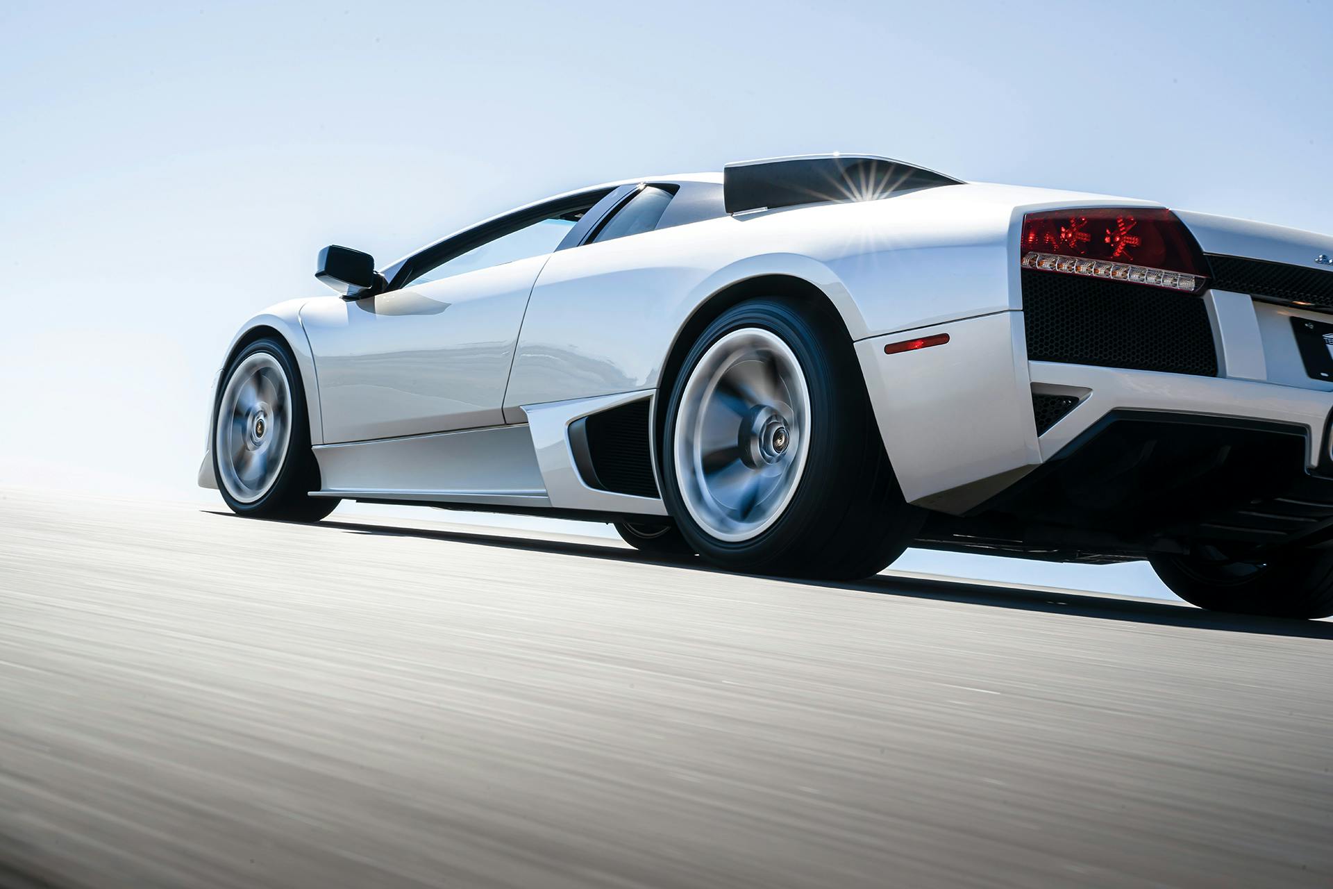 Lamborghini Murcielago rear three-quarter driving action close