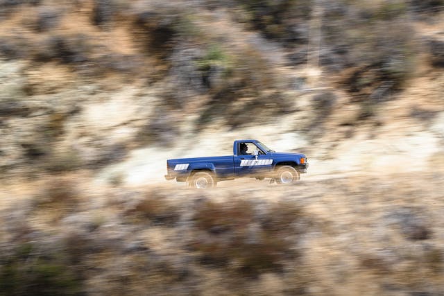 Toyota Pickup 4x4 SR5 driving action wide