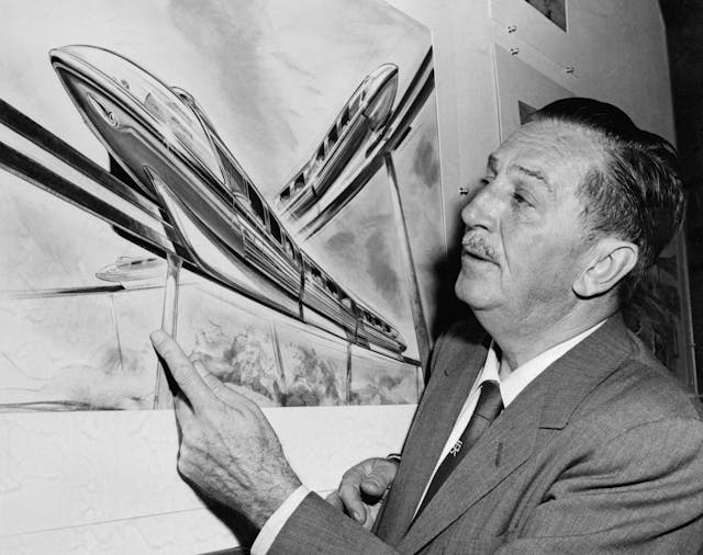 Walt Disney Looking at Illustration of Monorail