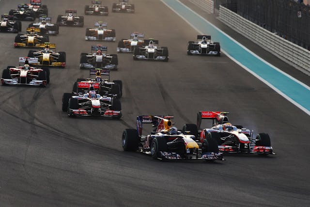 Sebastian Vettel of Germany and Red Bull Racing leads pack 2010 abu dhabi