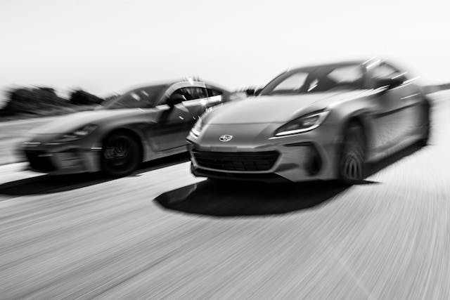 2022 Toyota 86 and Subaru BRZ black white blur action