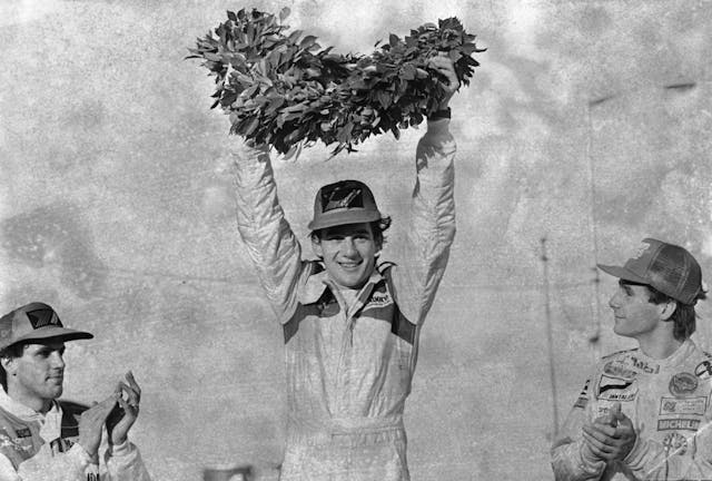 Ayrton Senna celebrating Macau black white