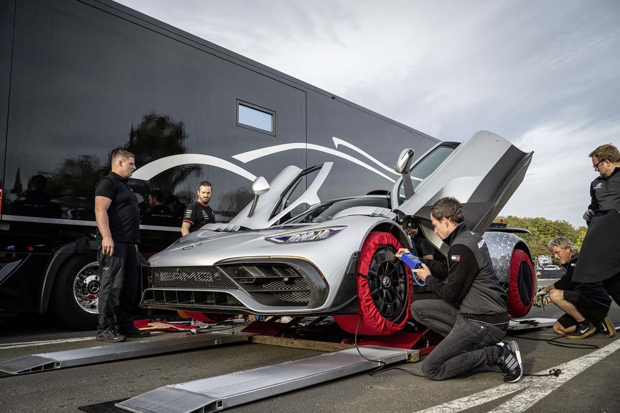 Mercedes-AMG ONE Nürburgring Lap Record techs around car with tire warmers