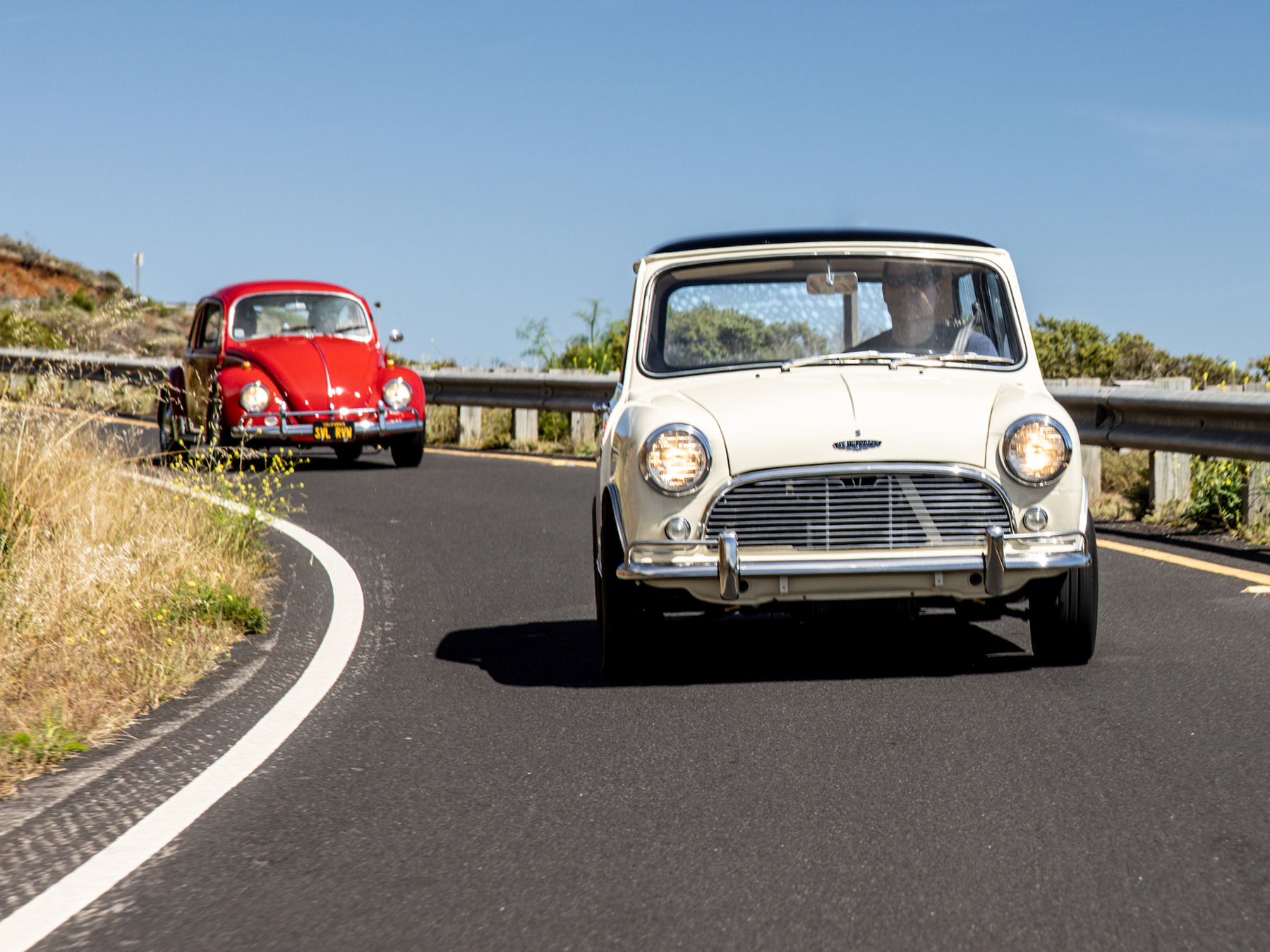 A day in San Francisco with two corgi-sized cars and their lanky