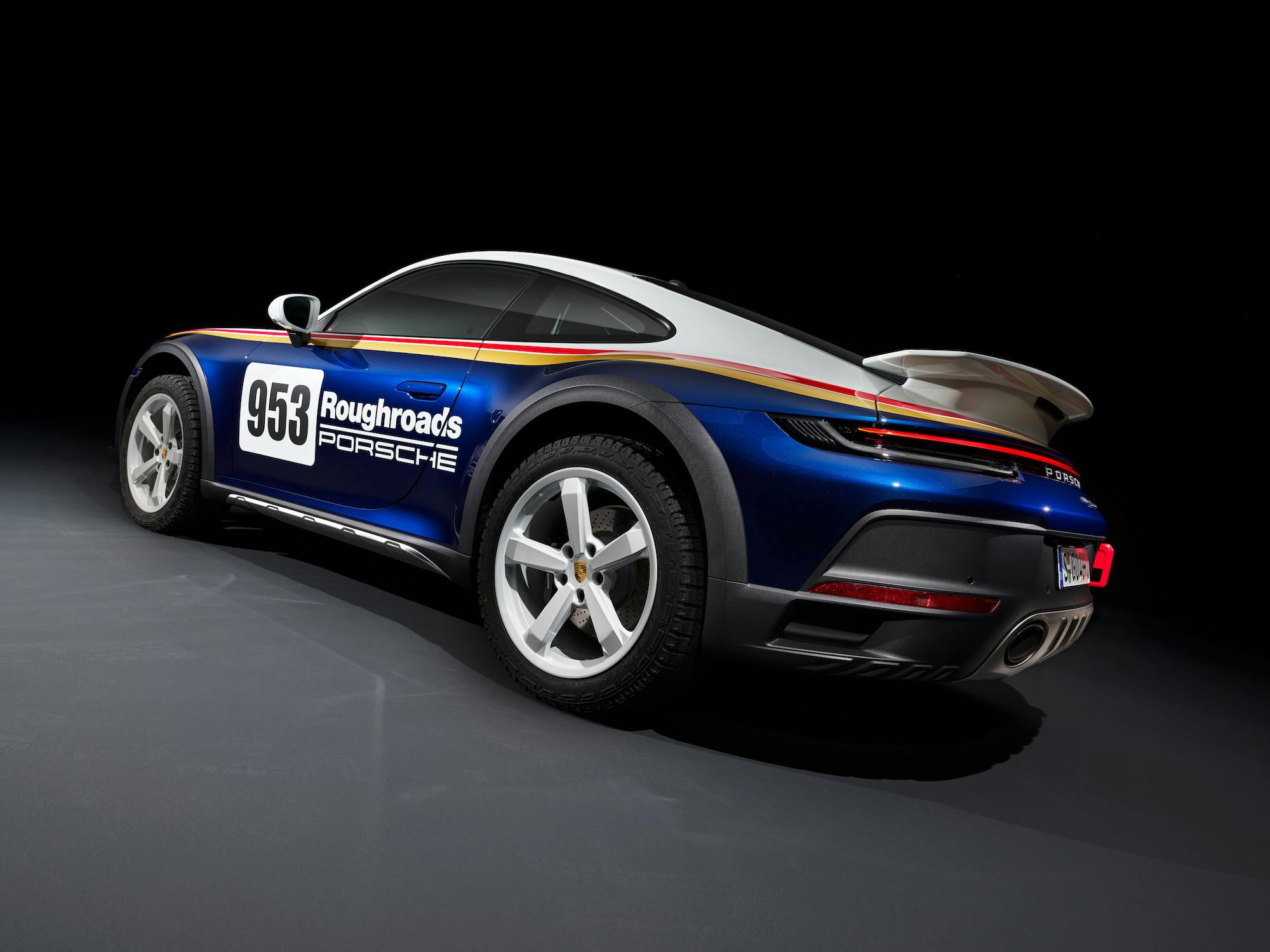 Porsche 911 Dakar studio rear three-quarter angled