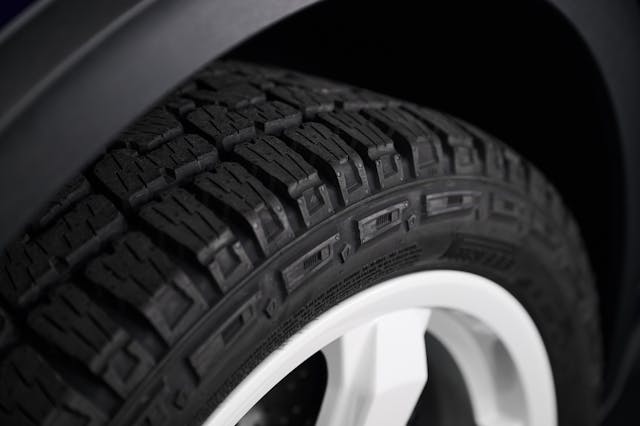 Porsche 911 Dakar studio rubber tire tread closeup