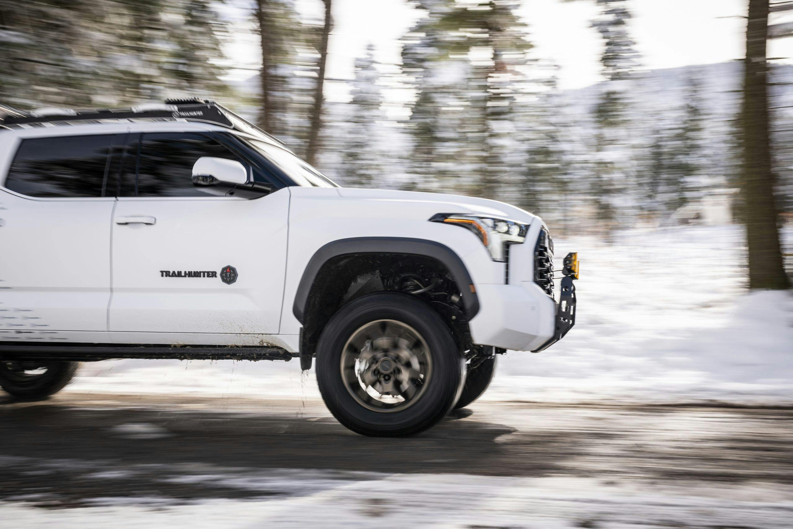 Toyota Trailhunter Concept exterior front end driving in snow