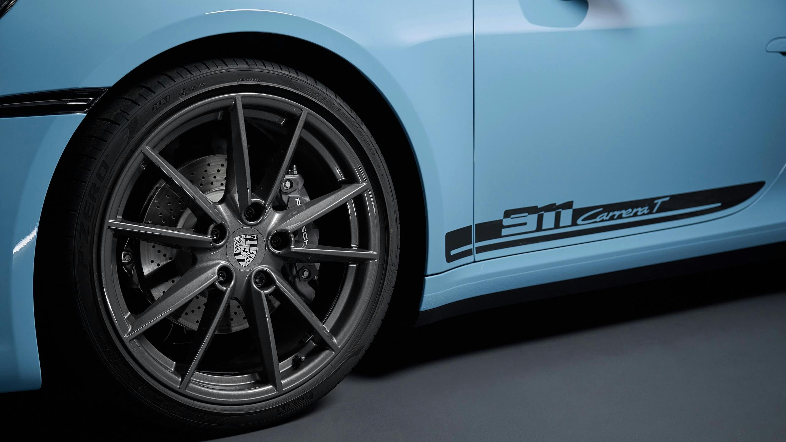 2023 Porsche 911 Carrera T blue front wheel tire