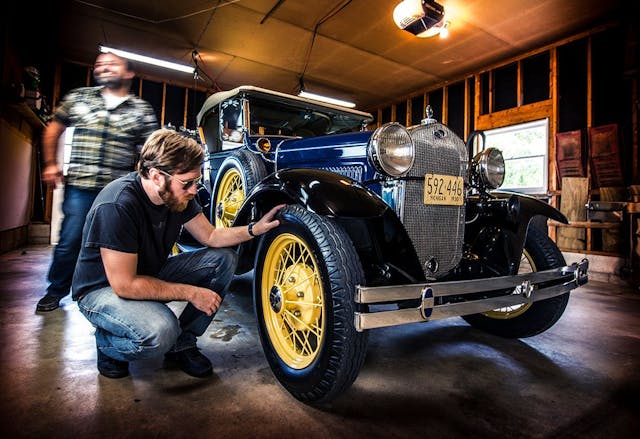 Ford Model A garage wheel tire inspection