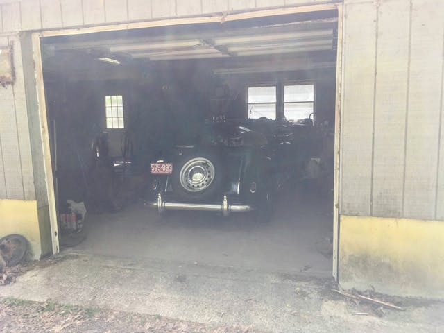 MG TD rear parked in old barn