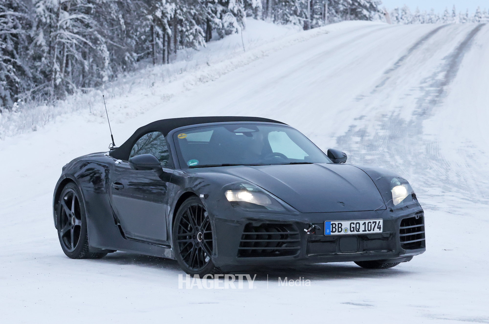 Electric Porsche Boxster spied testing in winter wonderland