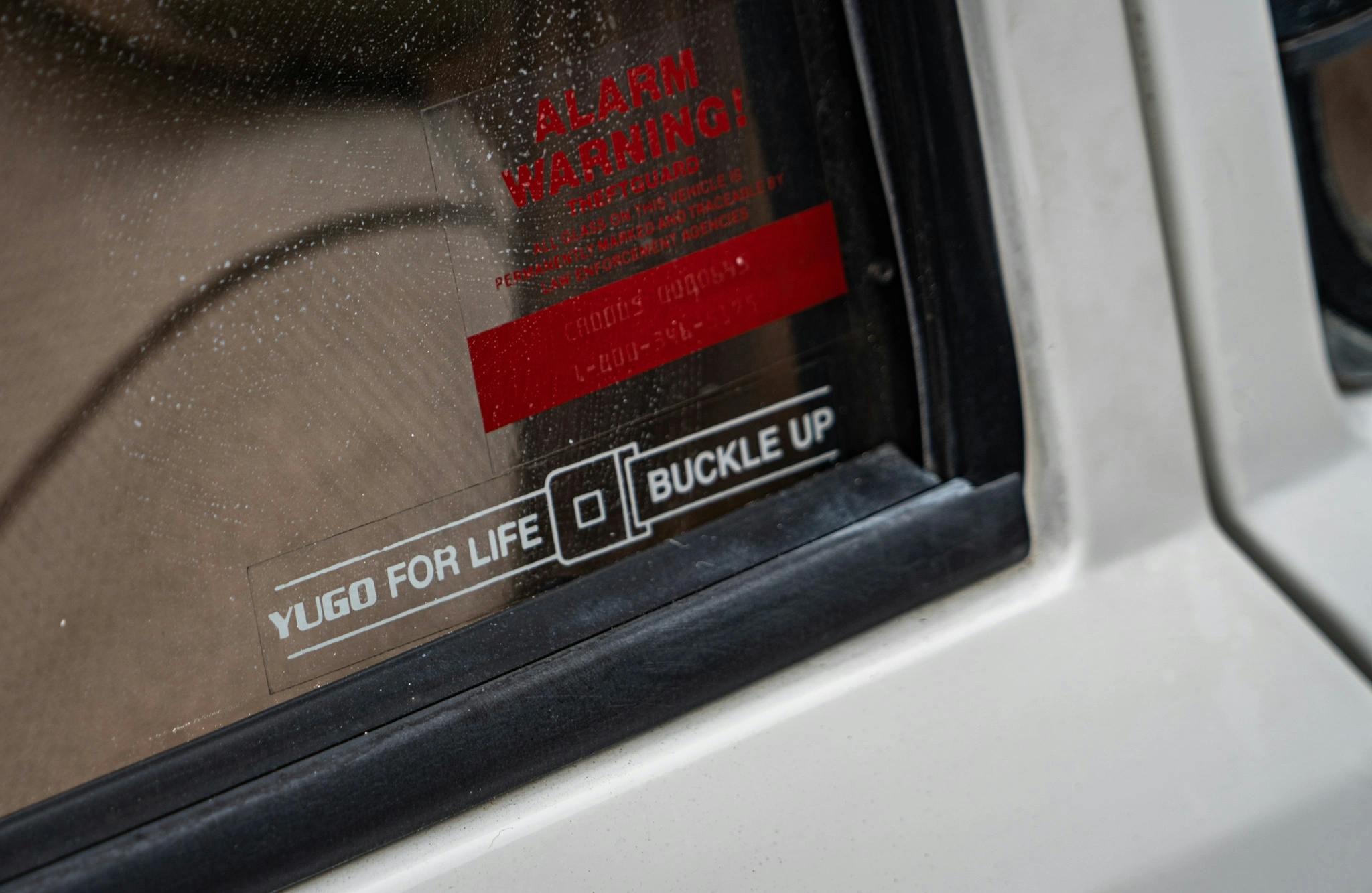 1988 Yugo GVL window safety anti theft stickers