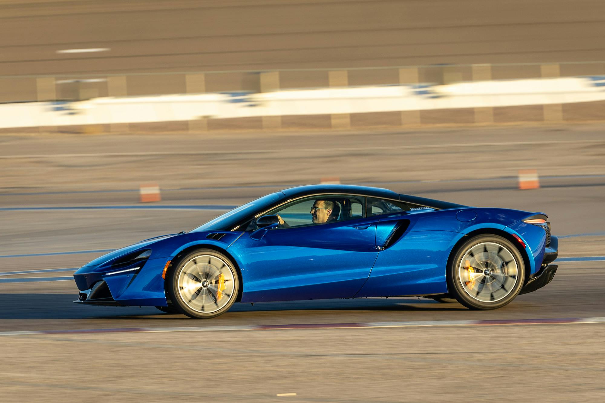 McLaren Artura track action driving side pan