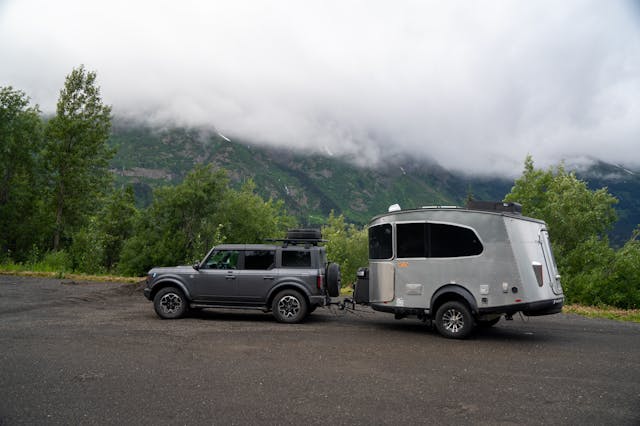 Bronco Airstream Alaska Road Trip side profile cloudy in mountains