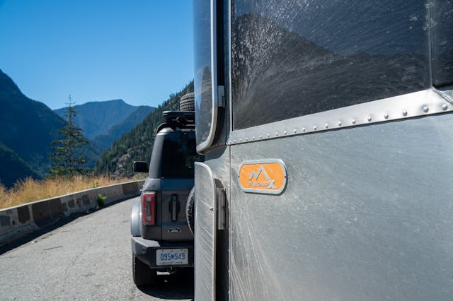 Bronco Airstream Alaska Road Trip Basecamp X badge and Bronco detail on Route 99