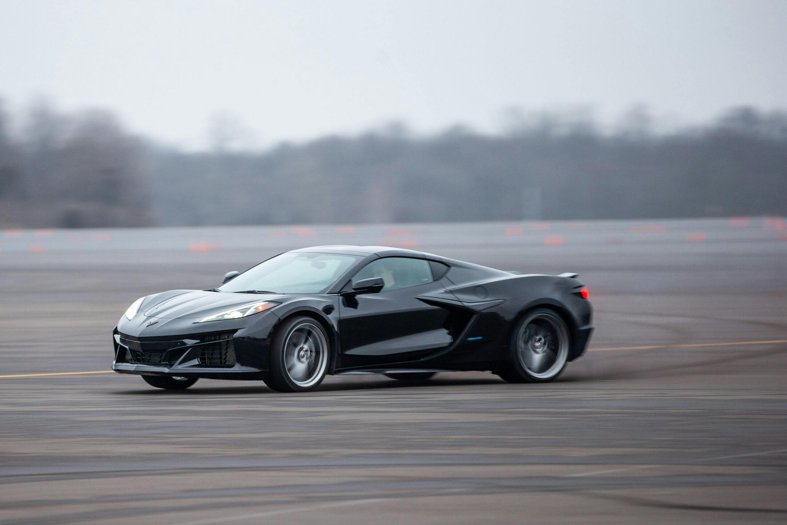 New Corvette E-Ray hybrid driving action front three quarter