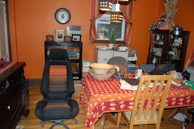 Orange Spectrum Recaro Office Chair at table in orange room
