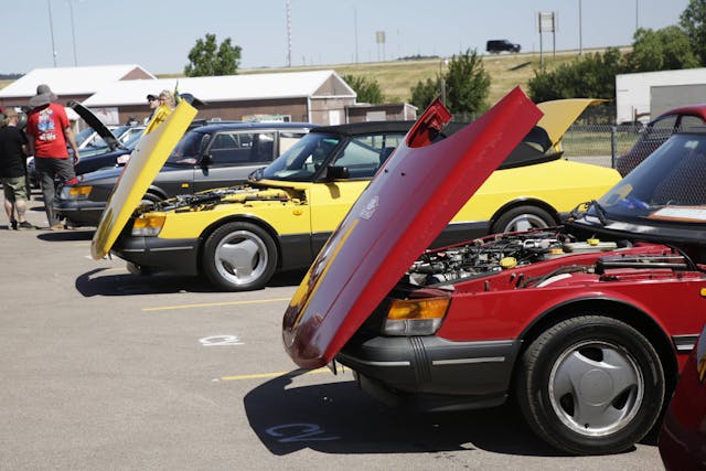 Saab parking lot cars front hoods up
