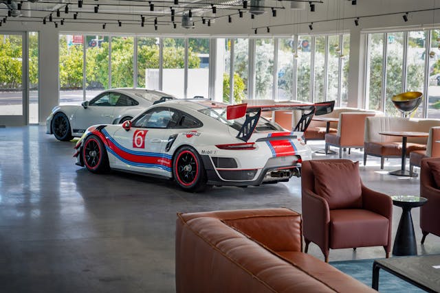 Hagerty Garage + Social lounge space with Porsches