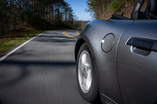 2001 BMW Z3 rear quarter wheel tire action blur