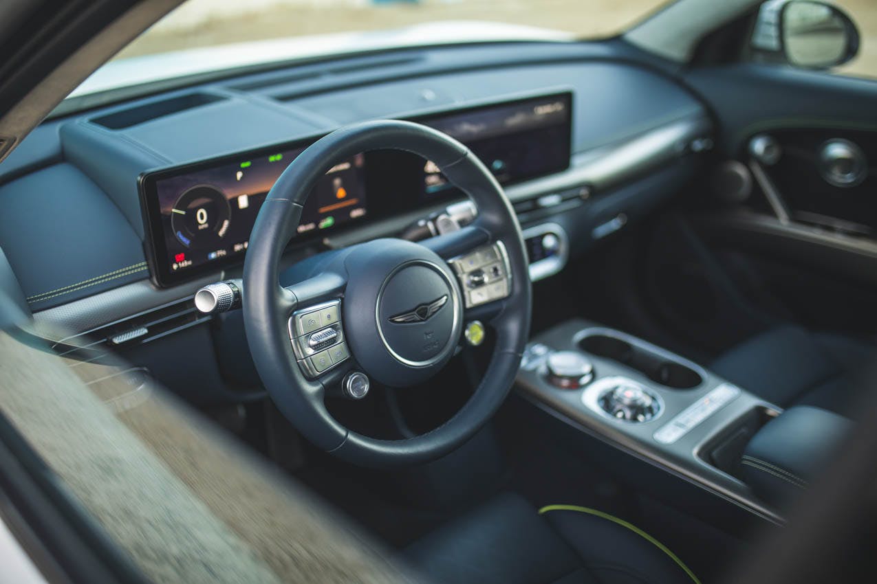 2023 Genesis GV60 Performance interior driver's controls through window
