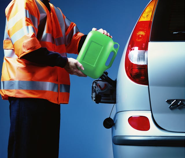 Roadside assistance with green petrol can