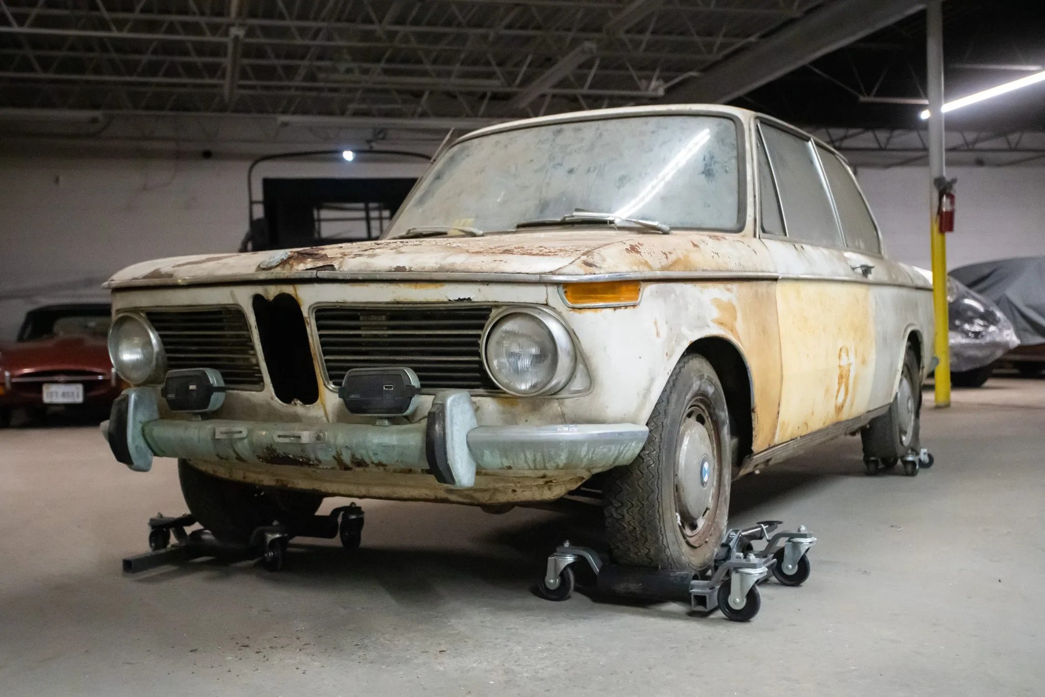 The basket case BMW 2002 on BaT Hagerty Media