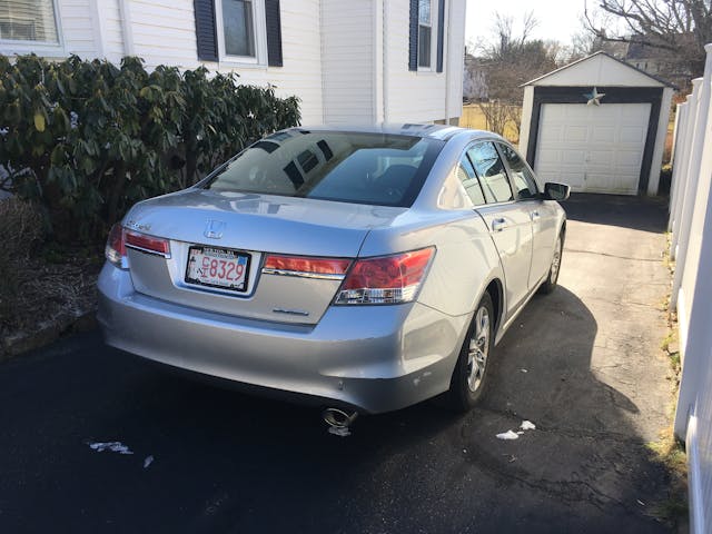 Silver Honda Accord rear three quarter