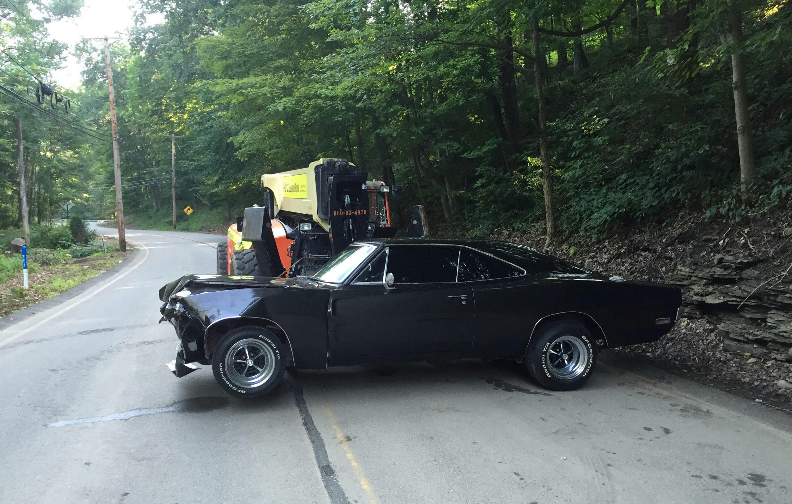Crashed Charger muscle car move prop