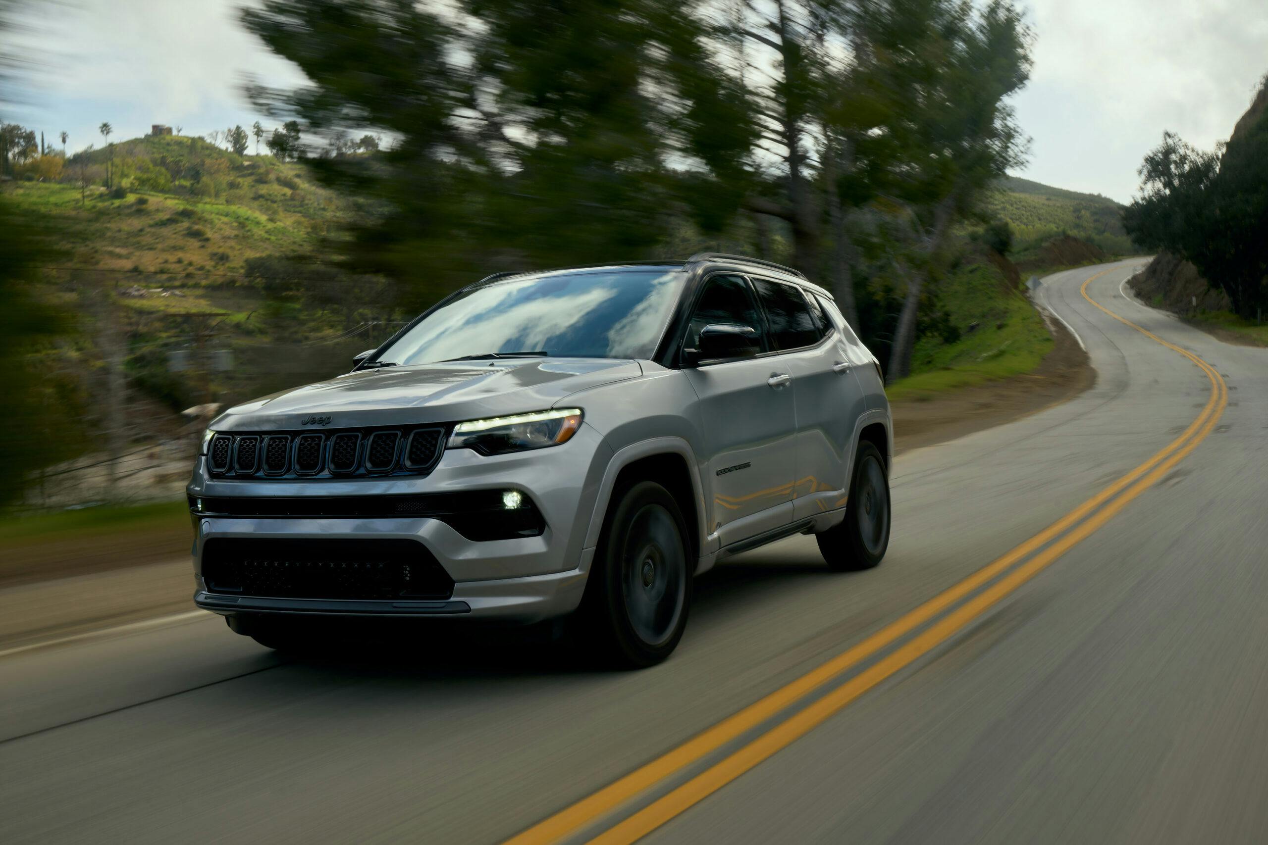 2023 Jeep Compass High Altitude 4x4 front three quarter driving action