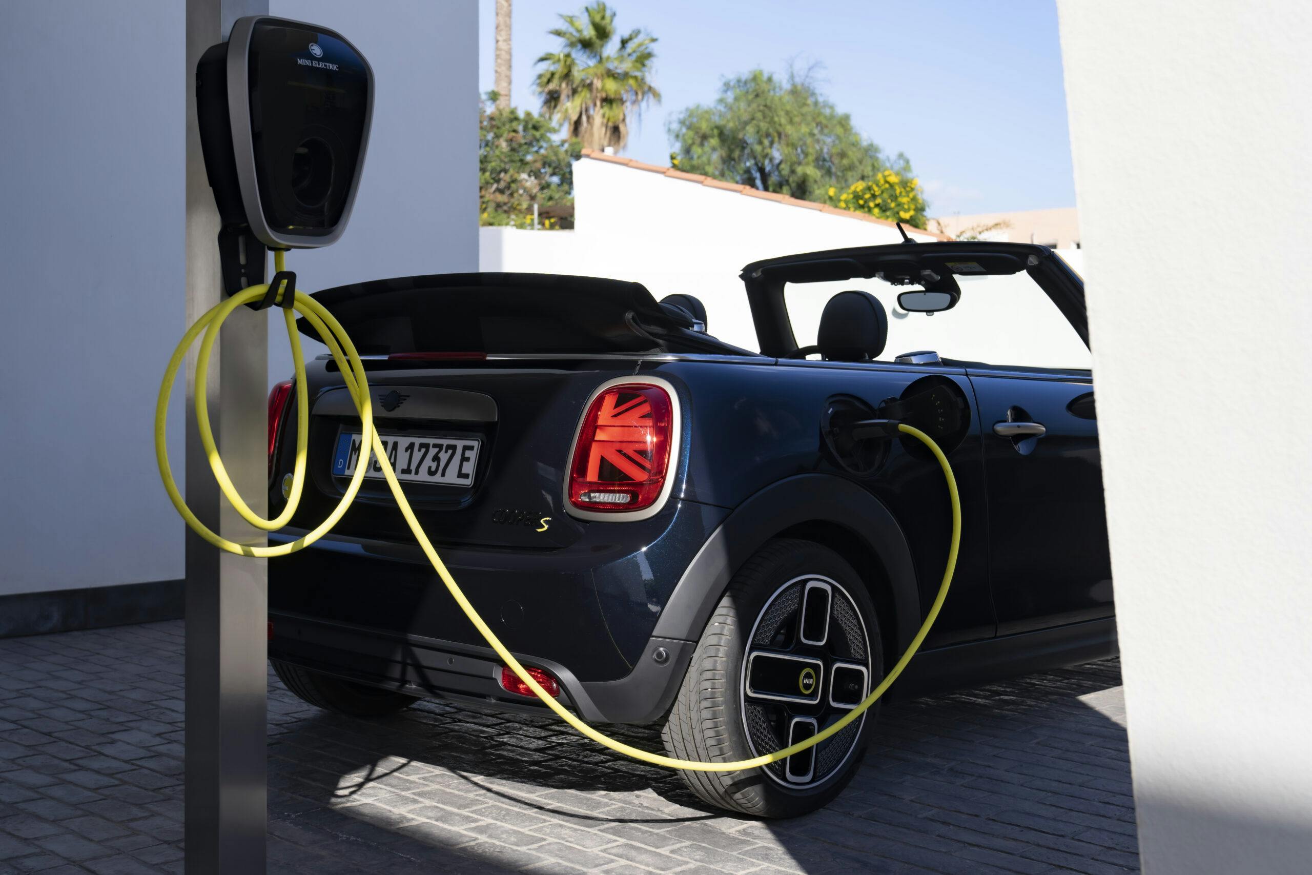 Mini Cooper BEV Convertible on charger rear close