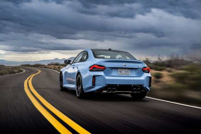 BMW M2 Zandvoort Blue driving action rear three quarter