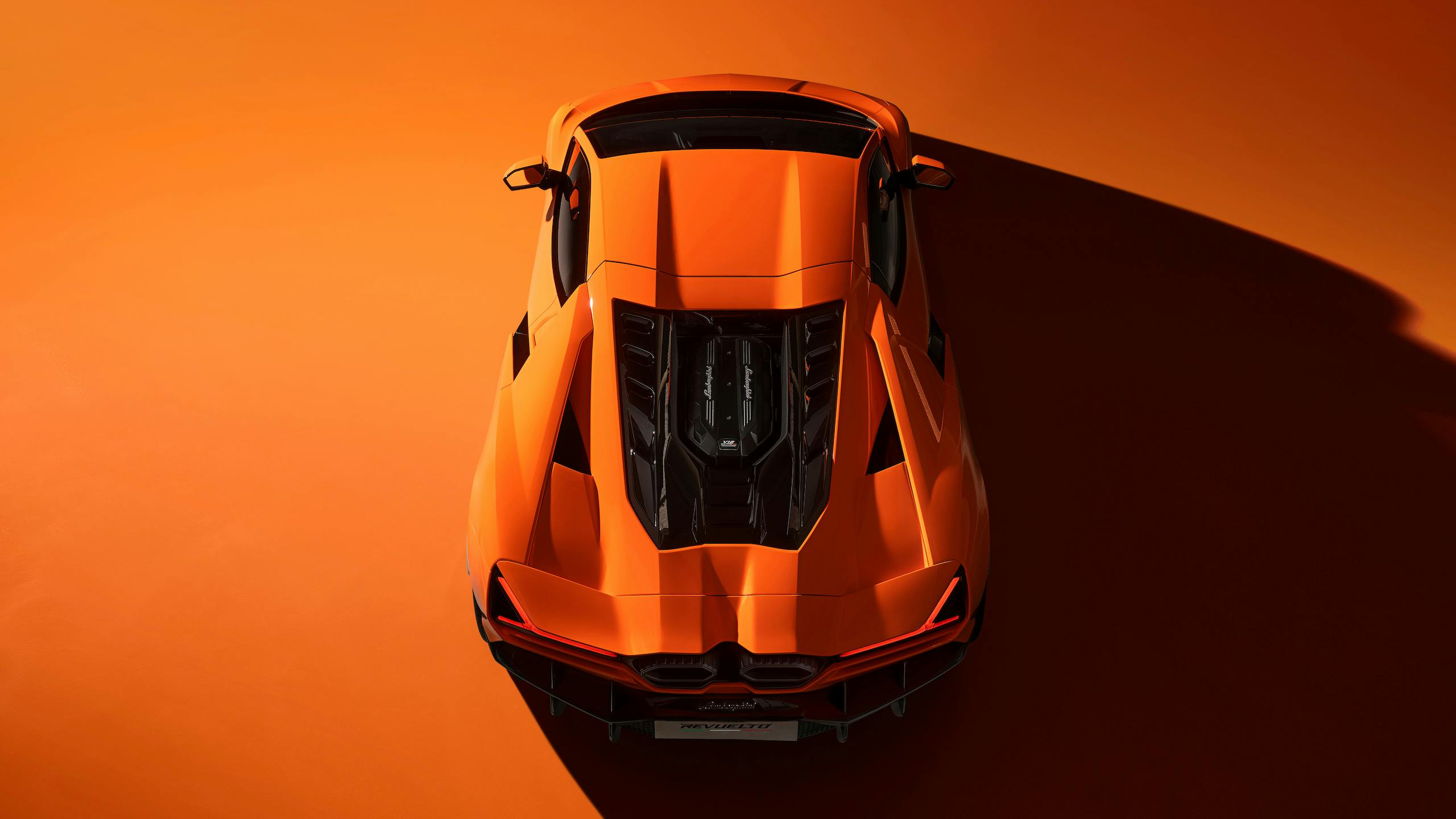Lamborghini Revuelto plug in hybrid supercar high angle rear