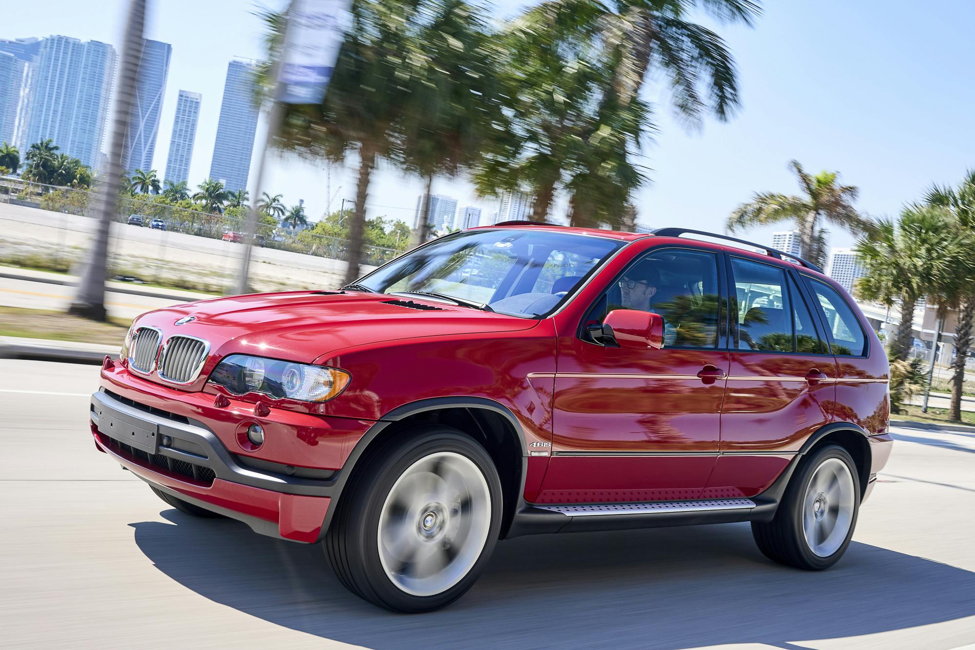 2003-BMW-X5-4.6is-red front three quarter