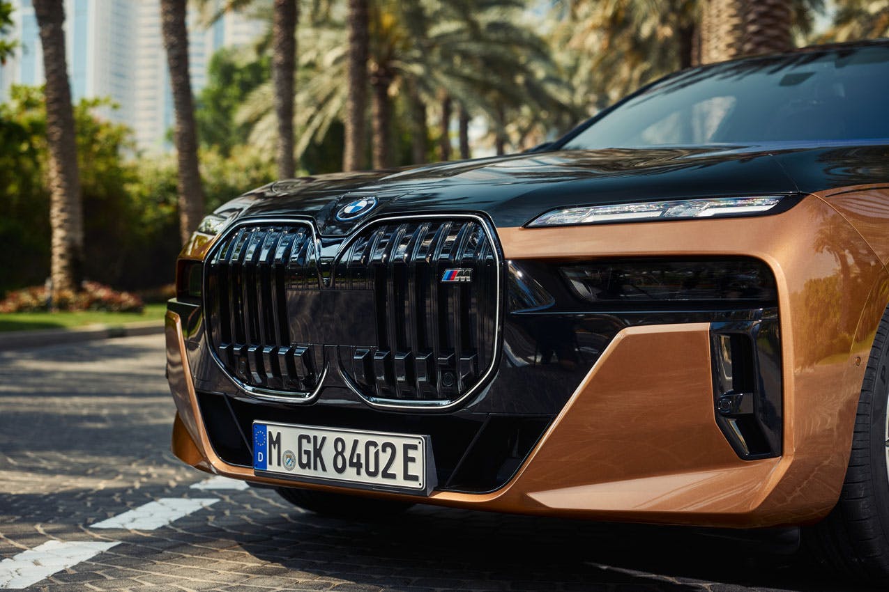 2024 BMW i7 M70 xDrive exterior front end detail by palm trees