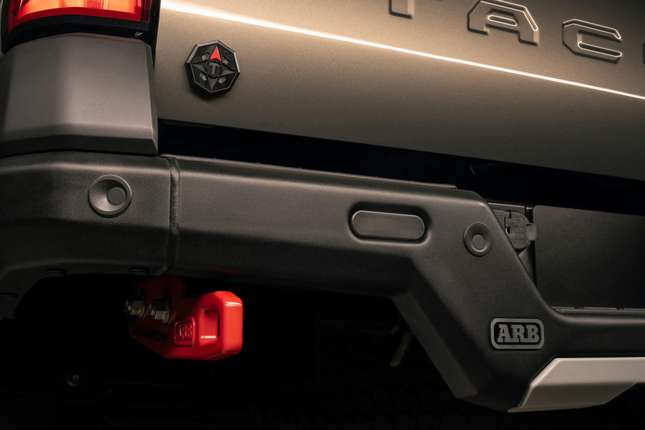 2024 Toyota Tacoma Trailhunter teaser ARB rear bumper and tow hooks
