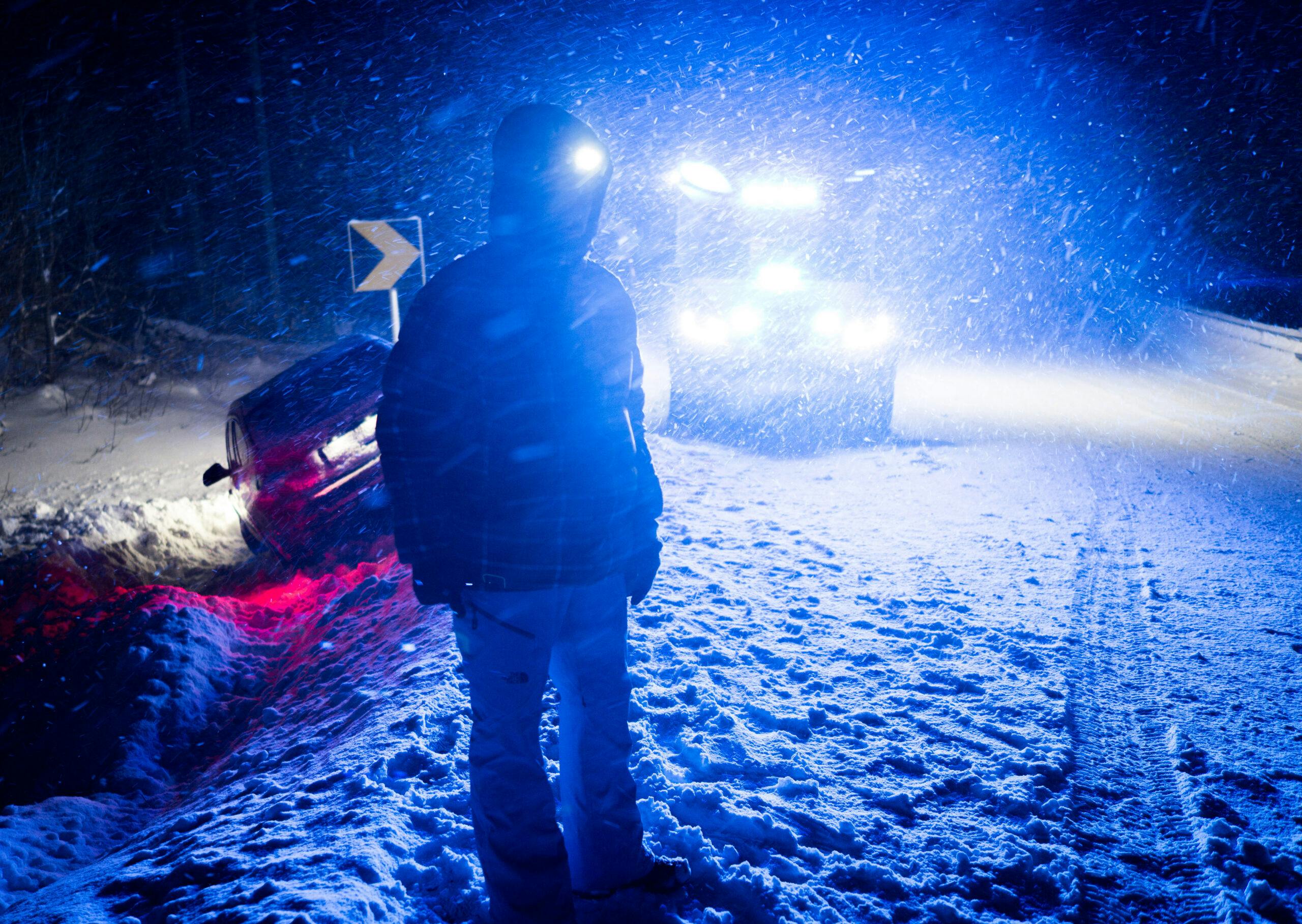 Ambulance vehicle on winter night road
