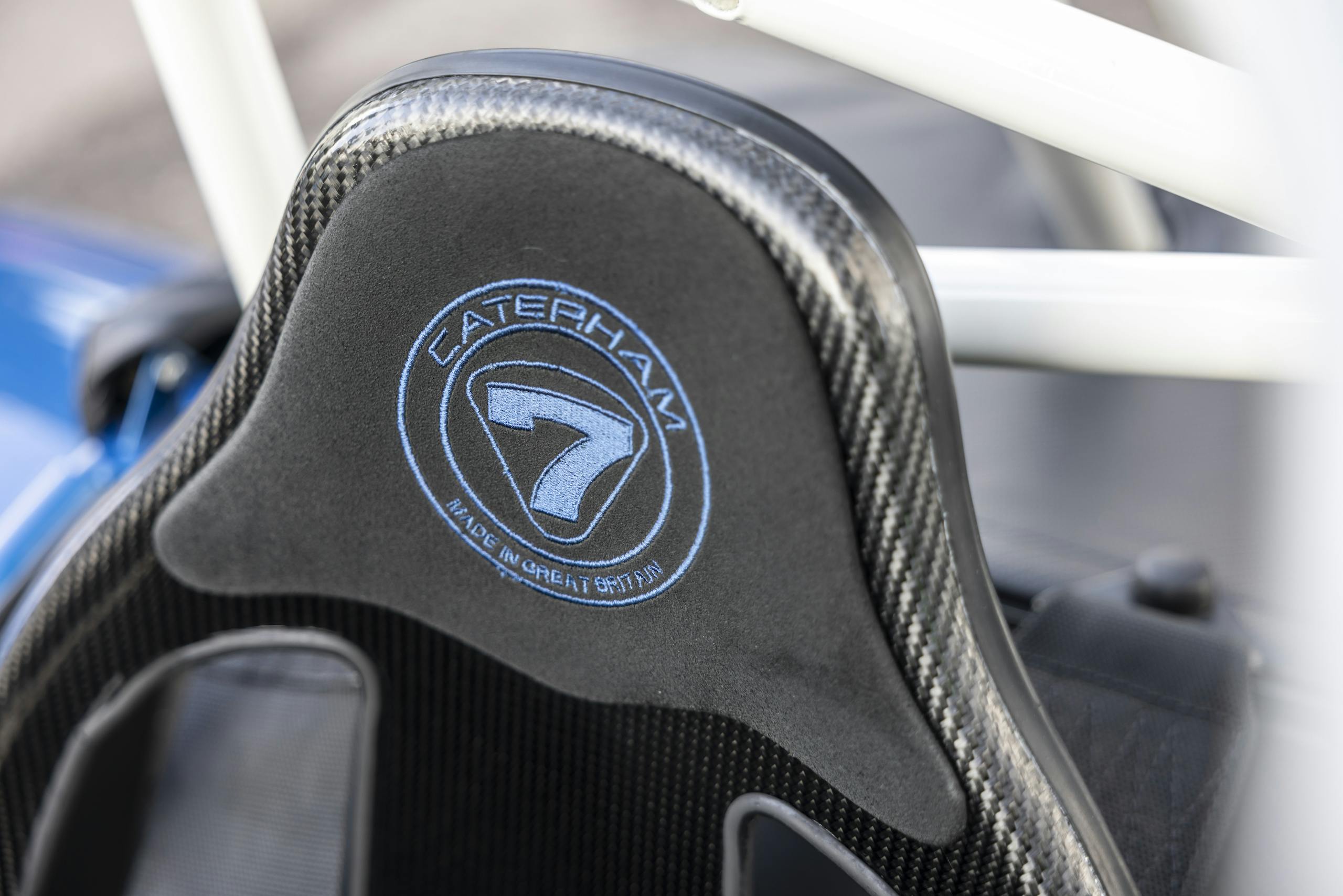 Caterham Cars driving action pan seat headrest embroidery detail