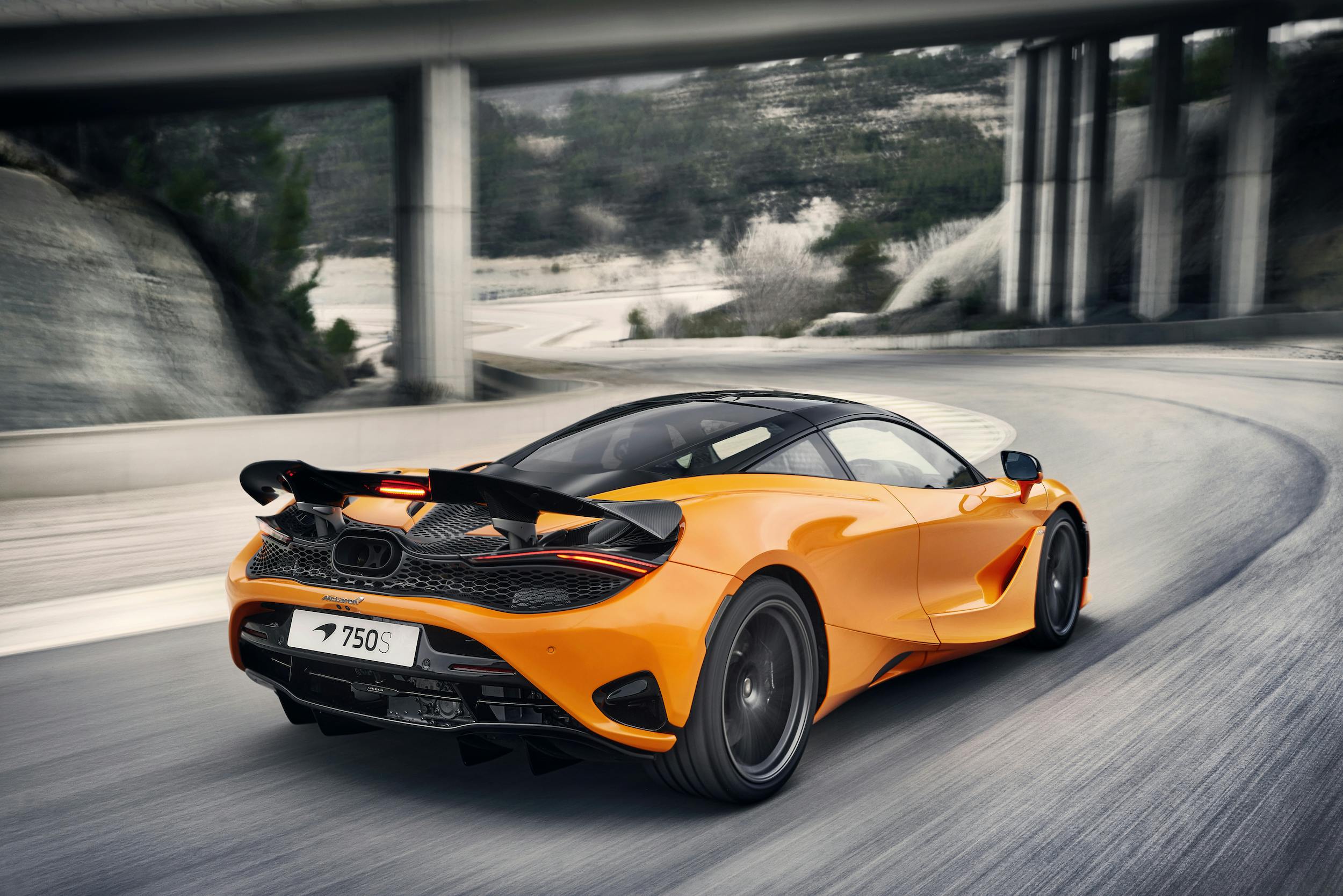 McLaren 750S Coupe rear three quarter dynamic driving action